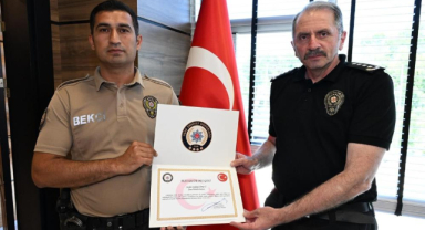 Uşak’ta örnek davranış sergileyen çarşı ve mahalle bekçisine teşekkür belgesi